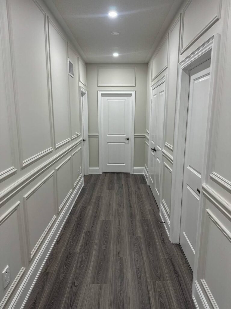 wainscoting wall painting Toronto modern interior custom panel wall painting Toronto luxury finish trim and molding painting Toronto residential home white feature wall painting Toronto professional painter